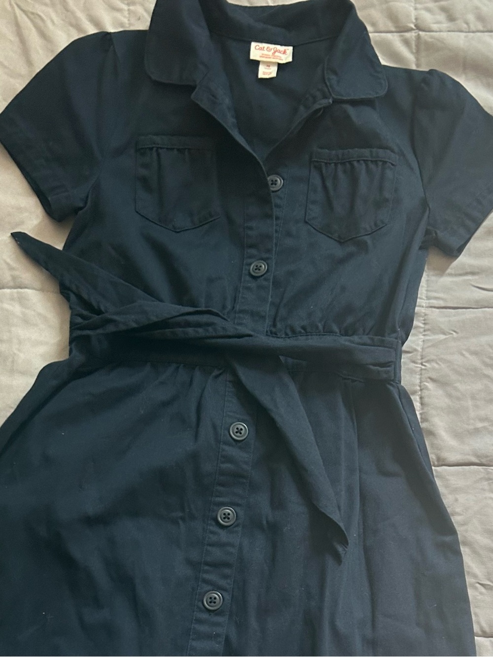 Girls school uniform; navy jumper and navy shorts. Size 10 girls.